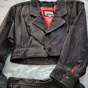 Black suede jacket and skirt.